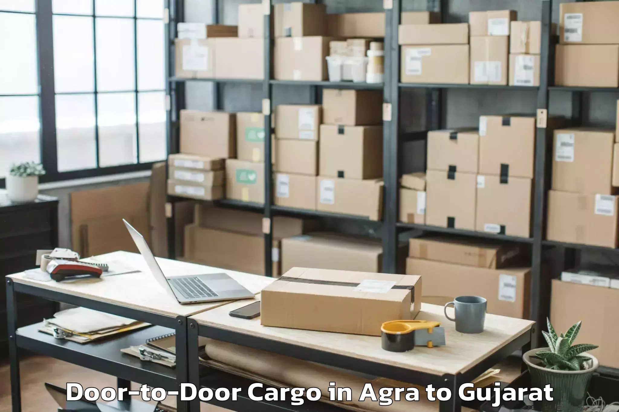 Easy Agra to Keshod Airport Ixk Door To Door Cargo Booking